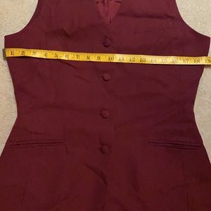Burgundy vest, could be a dress with leggings